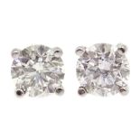 18ct white gold single stone diamond stud earrings, stamped 750,