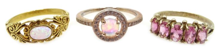 Three silver-gilt opal and stone set rings,