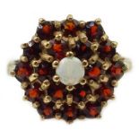 9ct gold garnet and opal cluster ring, hallmarked Condition Report Approx 4gm,