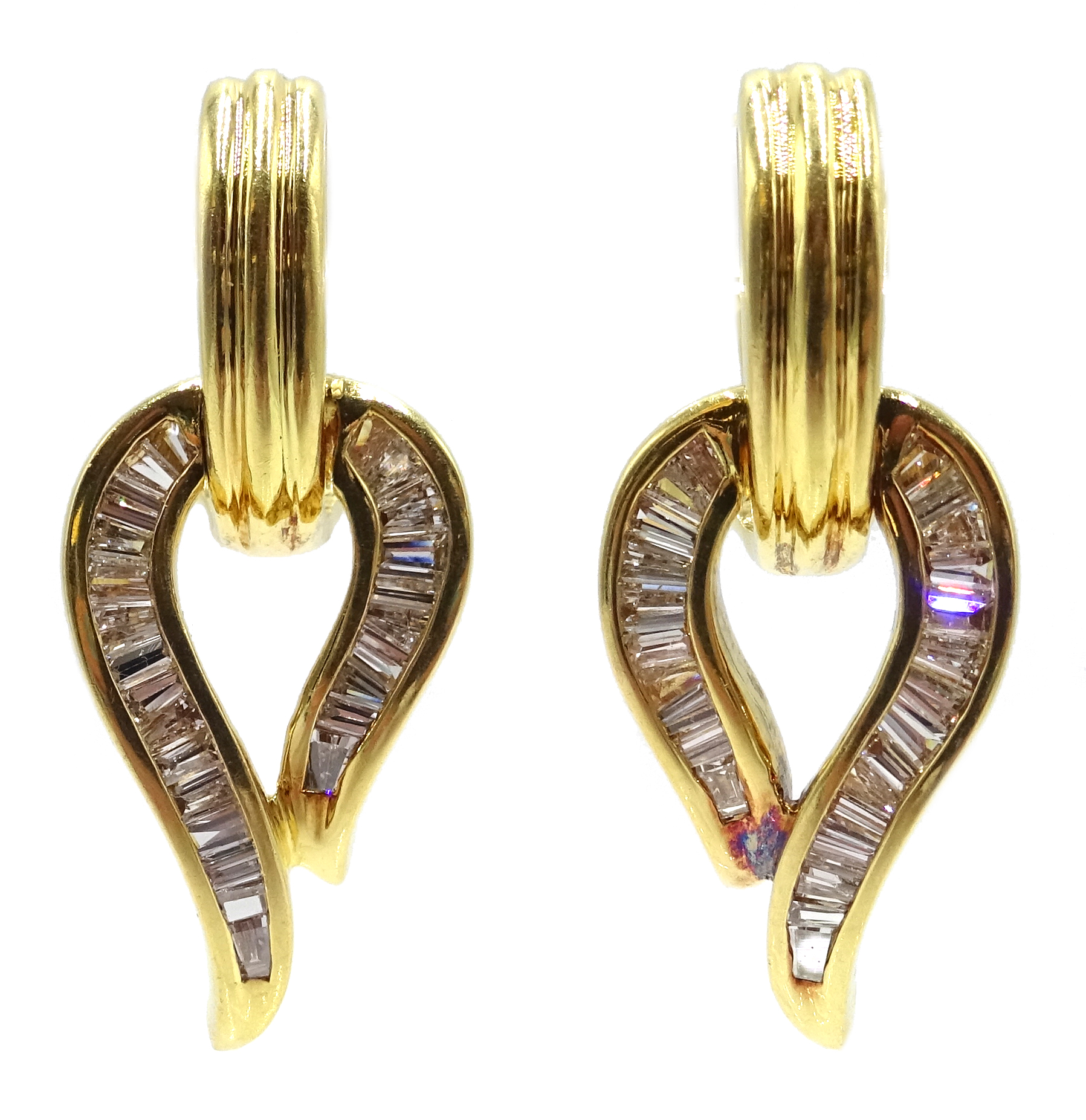 Pair of 18ct gold baguette diamond earrings,