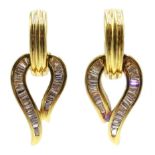 Pair of 18ct gold baguette diamond earrings,