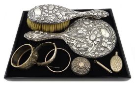 Art Nouveau silver mirror and brush, embossed flower decoration by Henry Williamson Ltd,