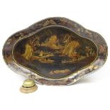 Chinoiserie decorated papier mache lacquer tray of shaped oval design decorated with a river