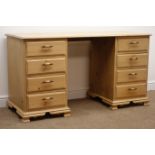 Solid pine twin pedestal desk, eight graduating drawers on shaped bracket supports, W140cm, H76cm,
