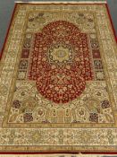 Keshan red ground carpet, central medallion, floral field, repeating border,