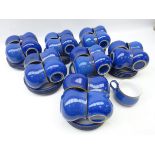 Set of twenty-eight Denby Imperial Blue cups and saucers,