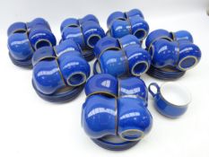 Set of twenty-eight Denby Imperial Blue cups and saucers,