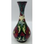 Moorcroft Ruby pattern bottle shaped vase designed by Rachel Bishop,