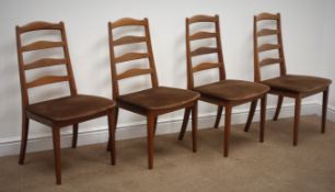 Set of four G-Plan teak ladder back dining chairs, upholstered seats and tapering supports,