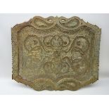 Large Eastern copper fretwork panel of shaped form with stylized fish motif borders and scrolling