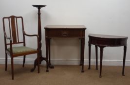 Early 20th century mahogany demi-lune table, hinged top on turned tapering supports with pad feet,