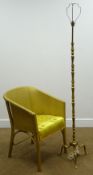 Brass finish standard lamp (H144cm) and gold finish armchair (W53cm)