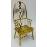 Miniature brass double bow Windsor chair with saddle seat and crinoline stretcher,