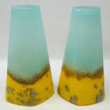 Pair tapered art glass vases decorated with stylized beach scene,