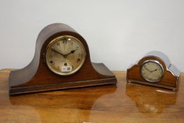 20th century arched oak cased mantle clock with silvered Arabic dial,