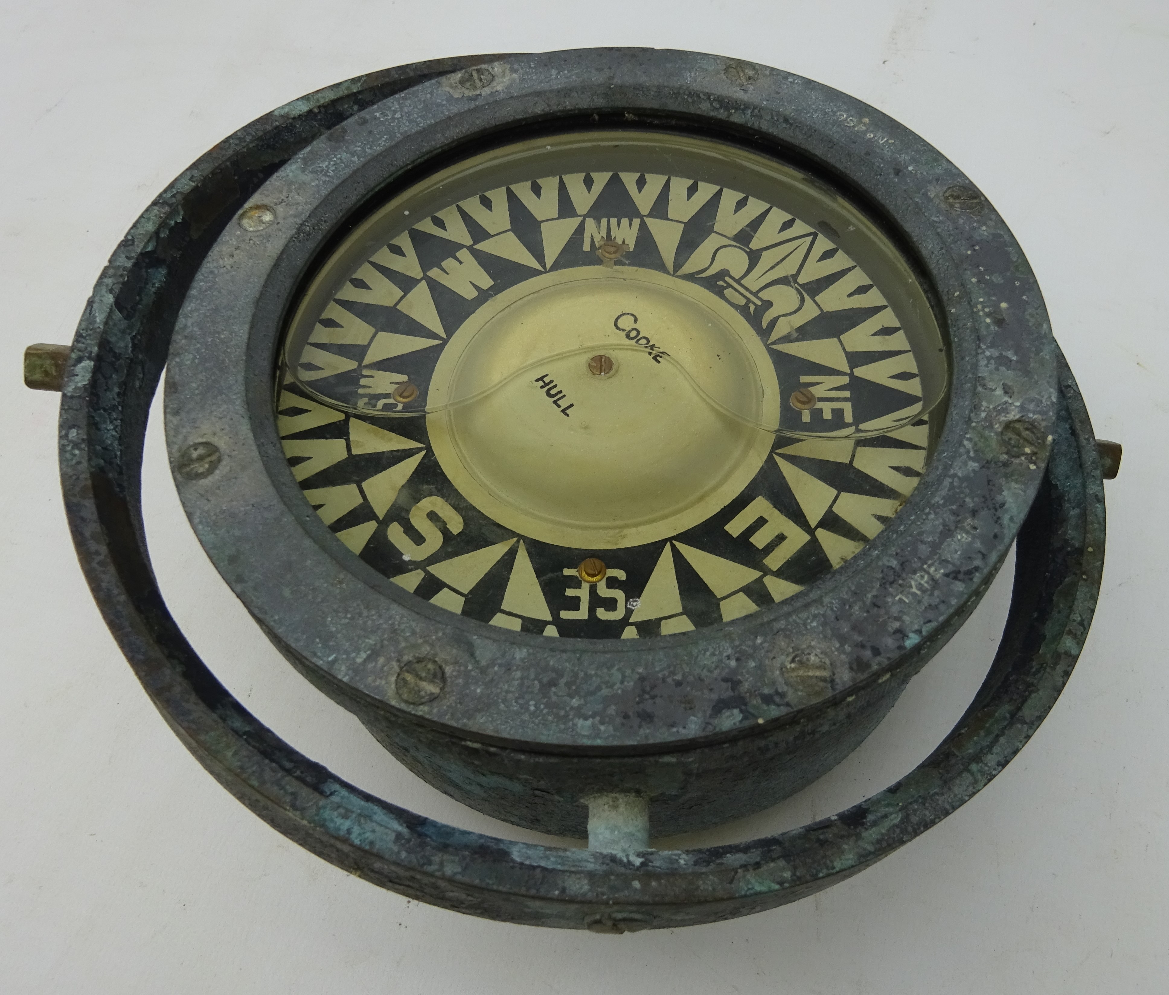 Brass cased ships compass, stamped Cook,