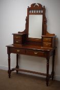 Victorian style hardwood dressing table, raised shaped bevel edge mirror back,