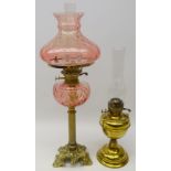 Cast brass reeded oil lamp with glass shade and reservoir H69cm and another brass oil lamp (2)