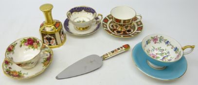 Royal Crown Derby Imari pattern bell, cup and saucer and cake knife,