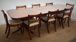 Regency style mahogany twin pillar dining table, with two leaves, moulded top, turned columns,