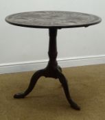 19th century mahogany tilt top tripod table, circular carved top with wells, single turned column,