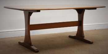 Ercol blonde elm rectangular coffee table, shaped solid end supports joined by single stretcher,