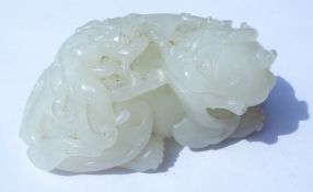 Chinese Mutton Fat Jade carving of a recumbent Dog of Fo with Cub, L7.5cm, H3.2cm x D4.