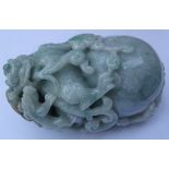 Chinese carved Burmese Jade model of a Dog of Fo with cub,