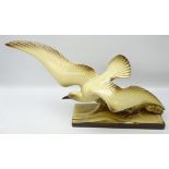 Art Deco pottery model of a seagull riding a wave,