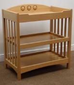 Three tier light beech baby changing station, towel rail, two under tier shelves, W89cm, H94cm,