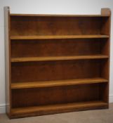 Large mahogany open bookcase with three shelves, on plinth base, W138cm, H138cm,