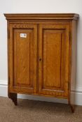 Early 20th century oak wall cupboard, two panelled doors enclosing two shelves, W44cm, H62cm,