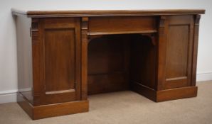 Late Victorian oak twin pedestal sideboard, moulded top,