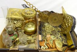 Two 19th century brass trivets, pair brass skimmers with open work handles, oil lamps,