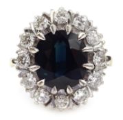 White gold oval sapphire diamond and cluster ring,