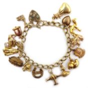 9ct gold charm bracelet with sixteen charms mostly hallmarked 9ct or stamped 375