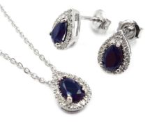 Silver diamond and sapphire pendant necklace and matching earrings,