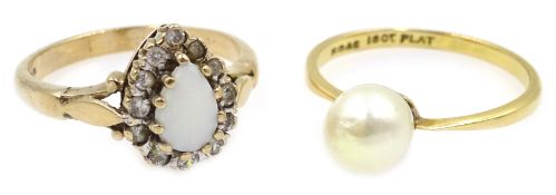 Gold single stone pearl ring stamped 18ct and a gold opal and stone set ring,