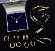 Five pairs of 9ct gold stone set earrings, stamped,