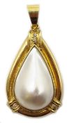 Gold pear shaped pearl and diamond pendant, stamped 18K Condition Report Approx 9.