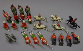 Quantity of die-cast figures by Britains etc including Queens Regimental Bugle band, Highlanders,