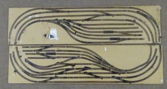 '00' gauge - layout of track only on large two-piece board set out as numerous concentric loops 244