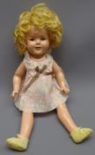 Shirley Temple composition head doll, probably by Ideal, with applied hair, sleeping eyes,