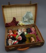 Seven mid-20th century scratch built hand puppets with papier mache heads depicting Mr. Punch, Mrs.