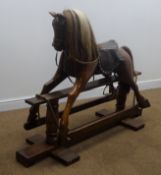 Victorian style rocking horse with sectional mahogany body, horse hair mane and tail,