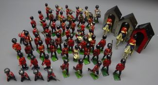 Over fifty Queen's guard die-cast figures by Britains etc including drummers and other band members,