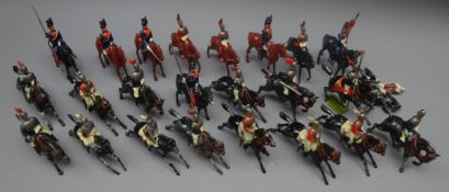 Twenty-four soldiers on horseback by Britains etc,