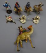 Eight die-cast Middle Eastern figures including camel rider,