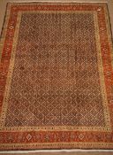 Tabriz blue ground rug, geometric pattern field, repeating border,