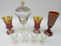 Bohemian ruby glass goblet, faceted body painted with flowers and scrolls H21.